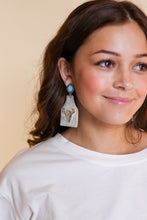 Load image into Gallery viewer, TAKE A NUMBER COWBOY WHITE COWHIDE SILVER COWSKULL STUD EARRINGS
